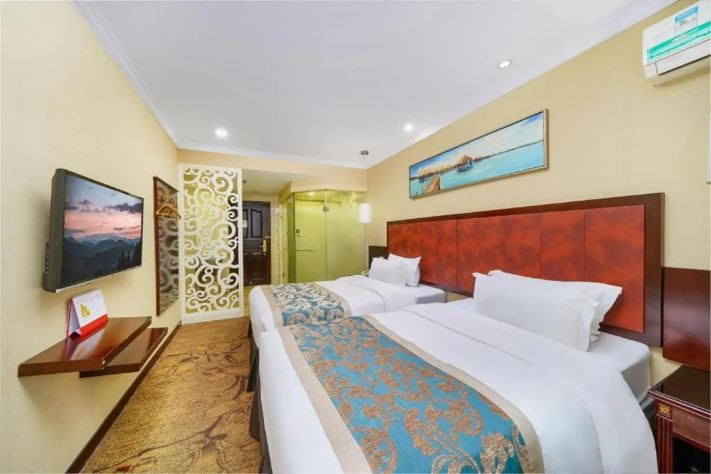 Bed in Sun Island Holiday Hotel