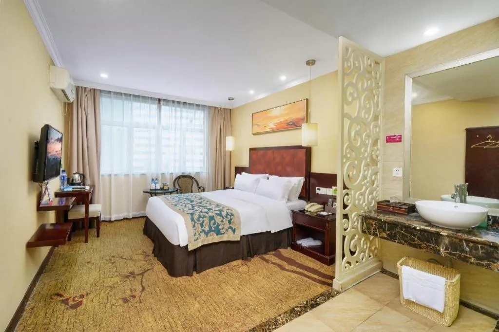 Bed in Sun Island Holiday Hotel