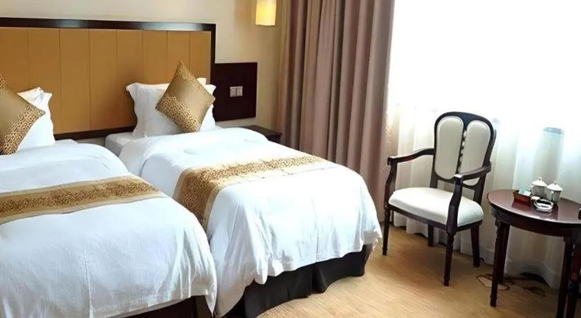 Bed in Sun Island Holiday Hotel