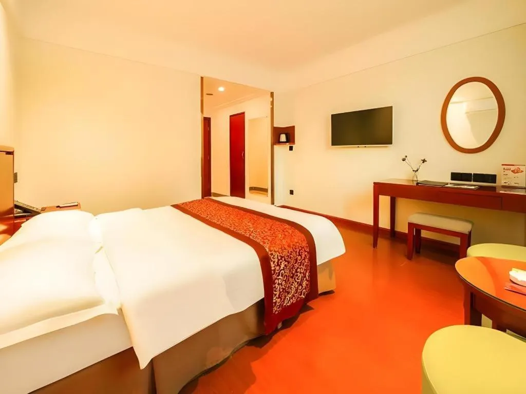 Bed in GreenTree Inn Suzhou Wuzhong