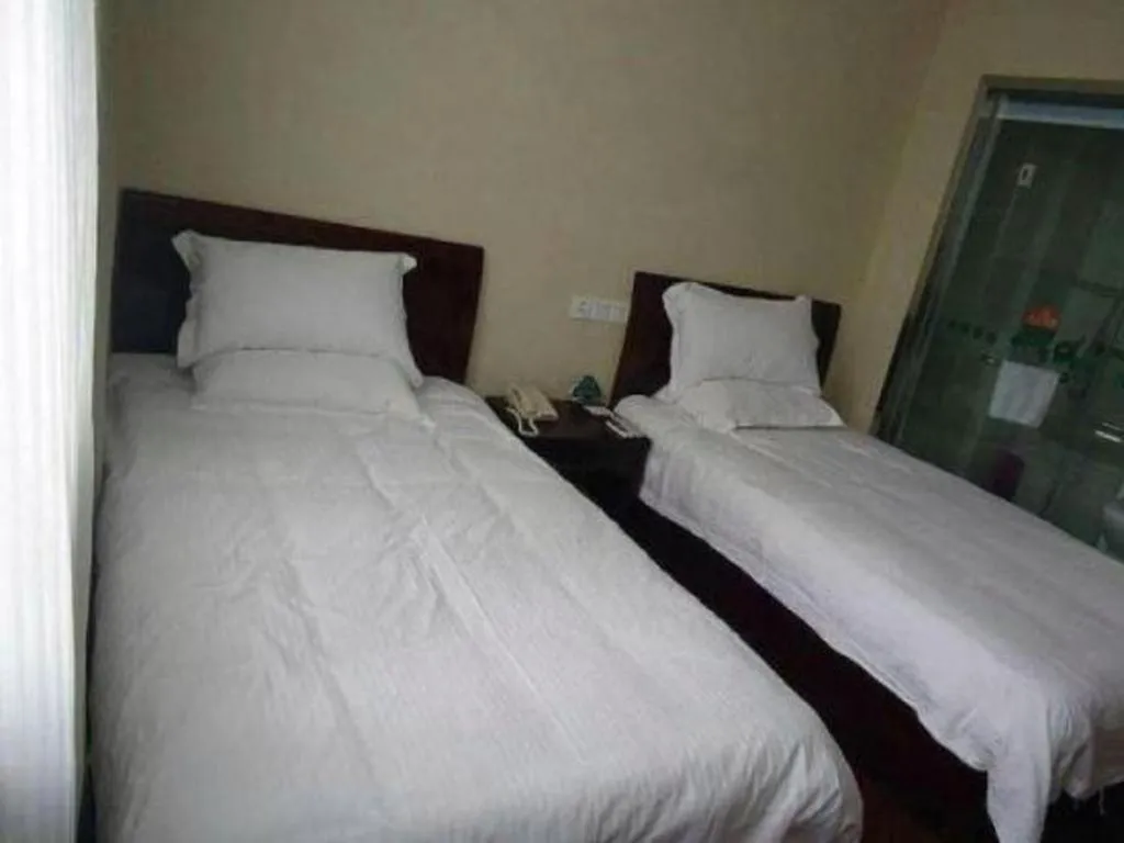 Bed in GreenTree Inn Suzhou Wuzhong