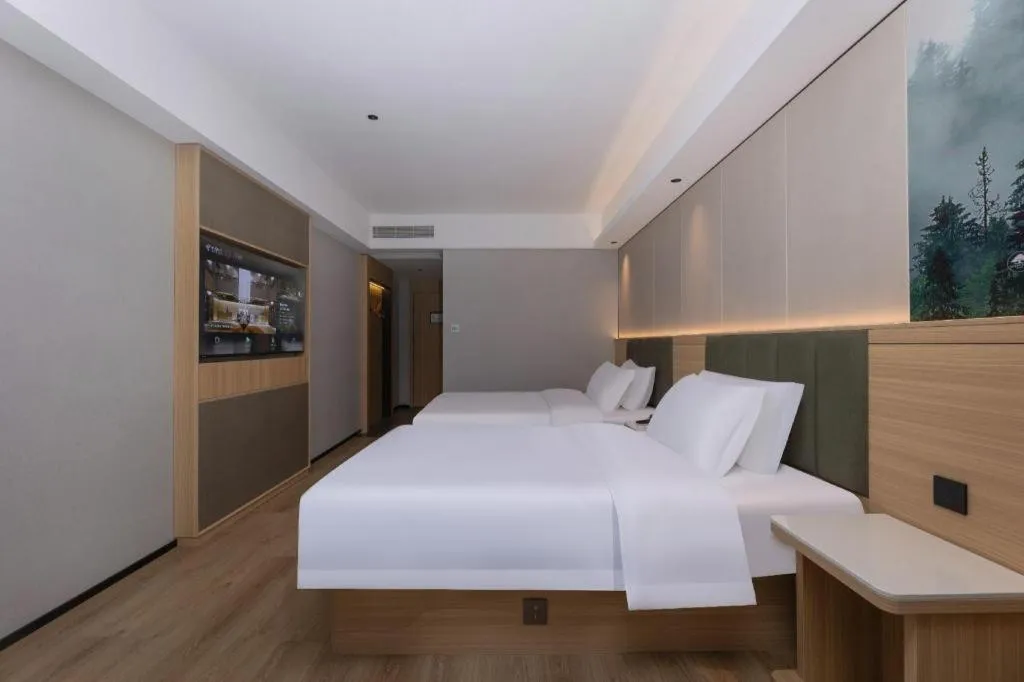 Bed in GreenTree Inn Suzhou Wuzhong