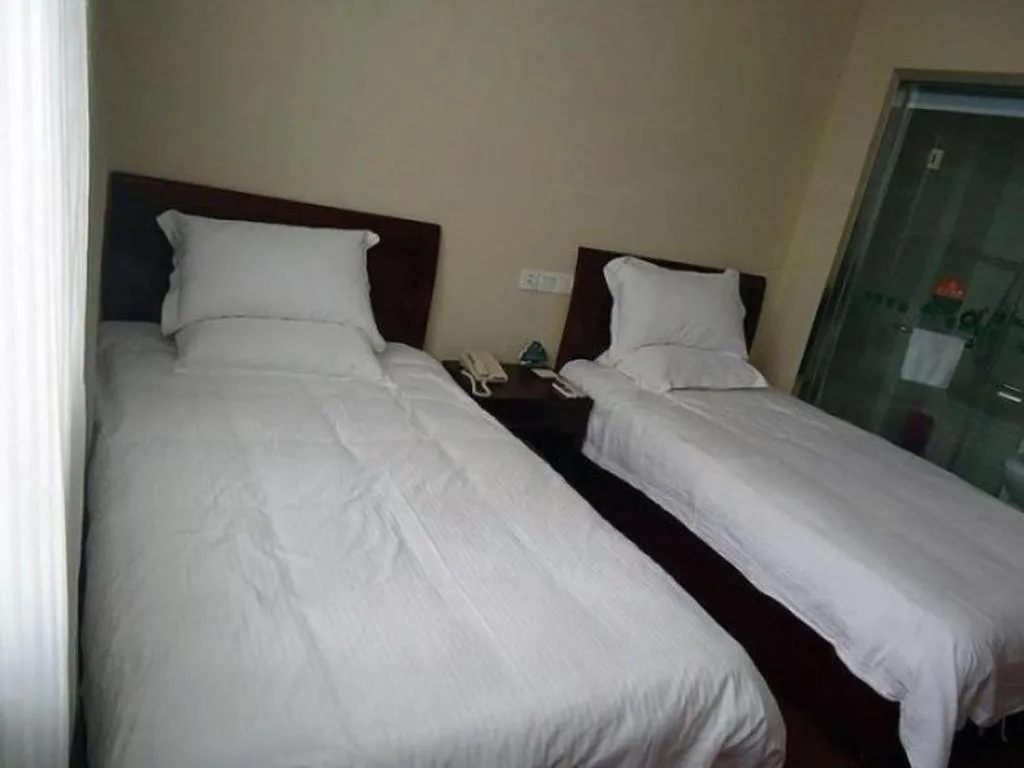 Bed in GreenTree Inn Suzhou Wuzhong