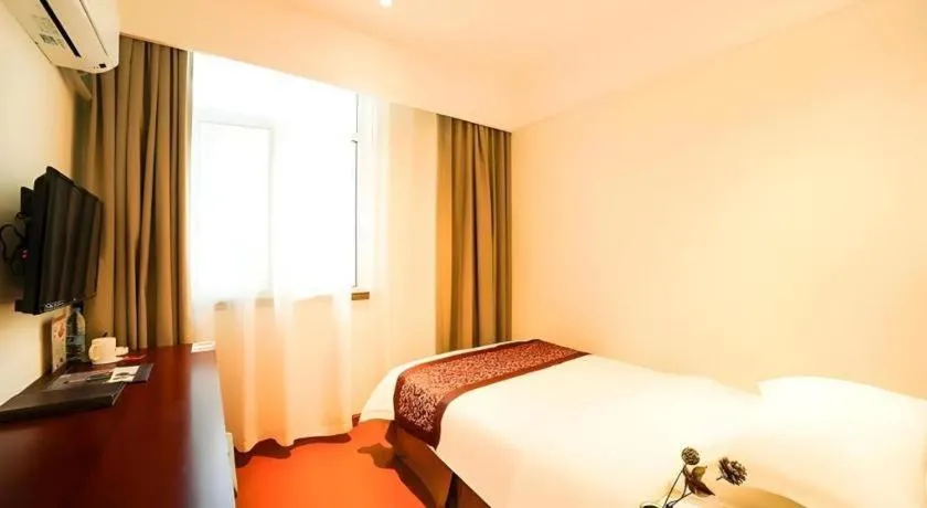 Bed in GreenTree Inn Suzhou Wuzhong