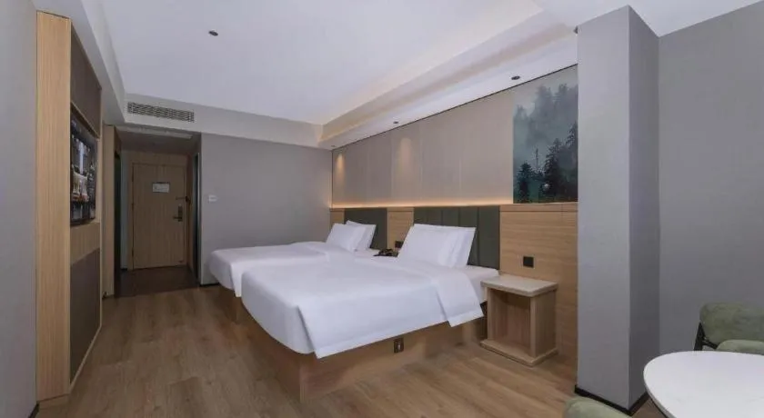 Bed in GreenTree Inn Suzhou Wuzhong