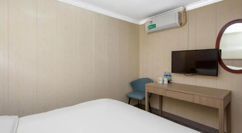 Bed in GreenTree Inn Hotel - Nantong Hongming Plaza