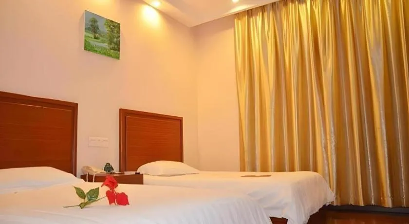 Bed in GreenTree Inn Shanghai Xupu Bridge Hotel