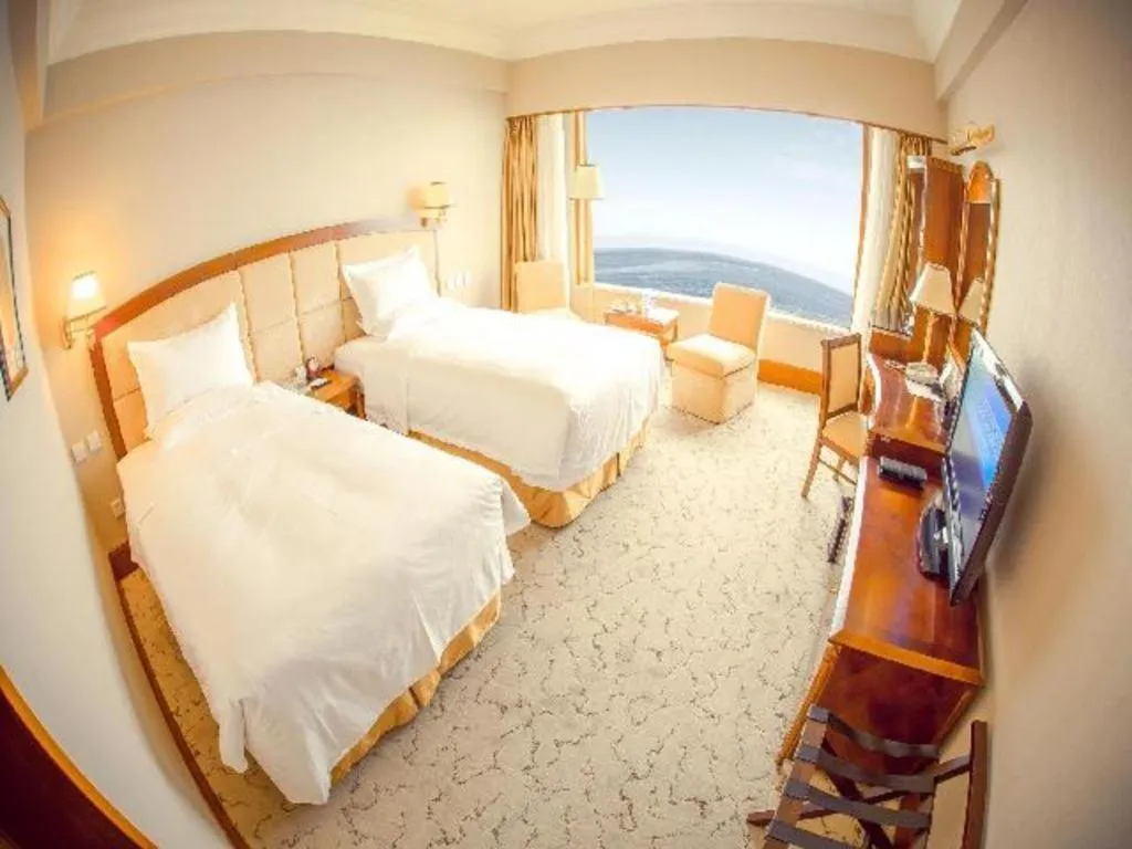 Bed in Golden Bay Hotel Weihai