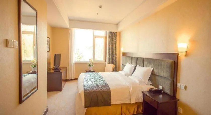 Bed in Golden Bay Hotel Weihai