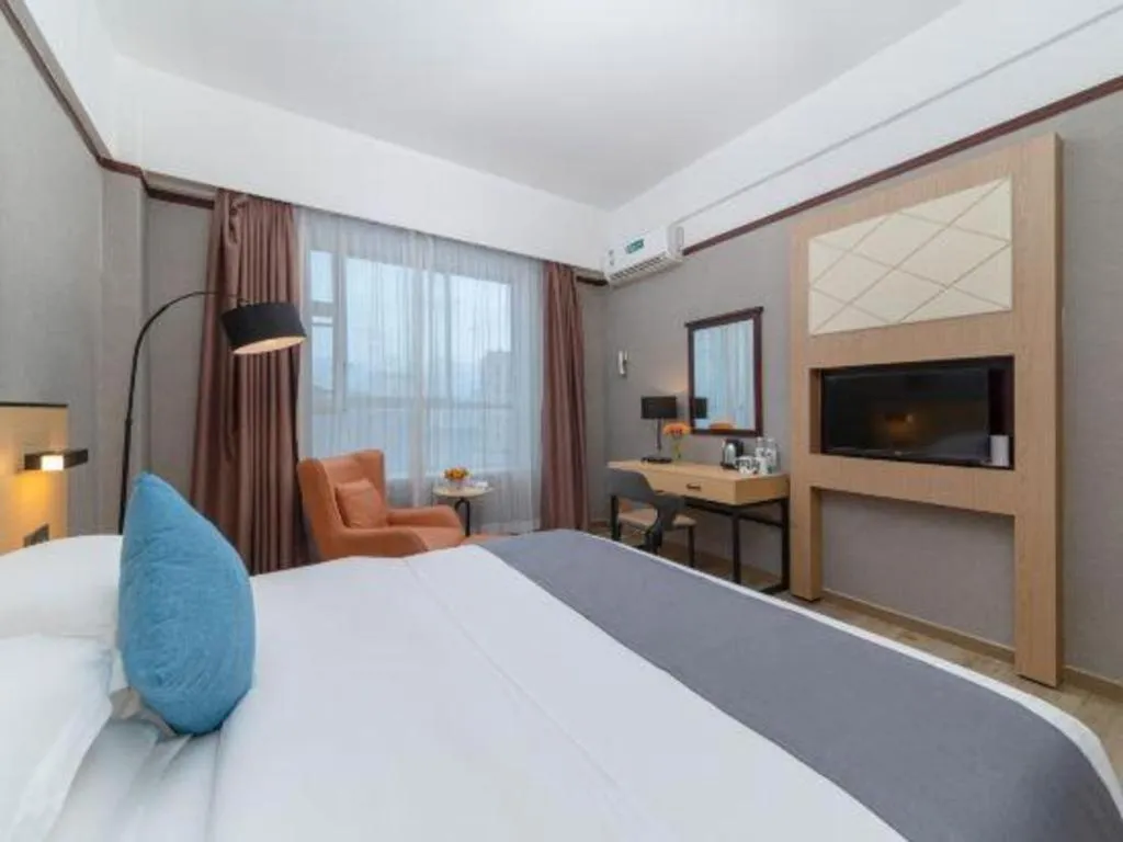 Bed in GreenTree Inn Zhongshan Nanlang Metro Station Branch