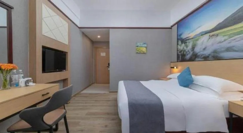 Bed in GreenTree Inn Zhongshan Nanlang Metro Station Branch