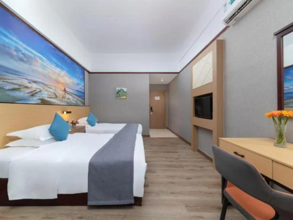 Bed in GreenTree Inn Zhongshan Nanlang Metro Station Branch