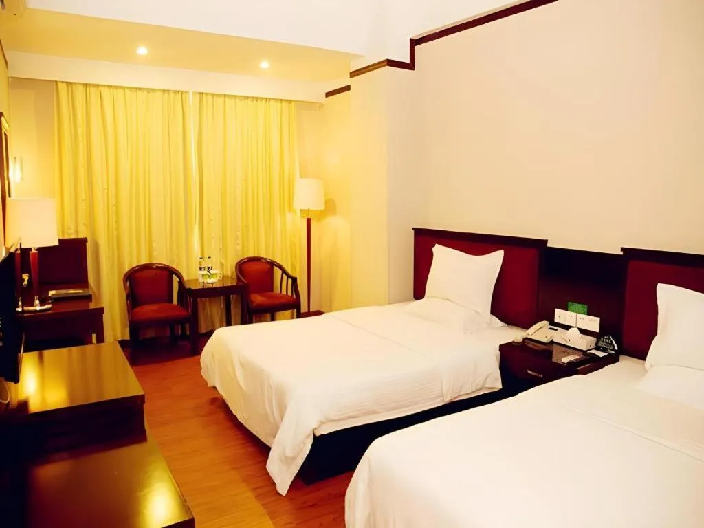 Bed in GreenTree Inn Zhongshan Nanlang Metro Station Branch