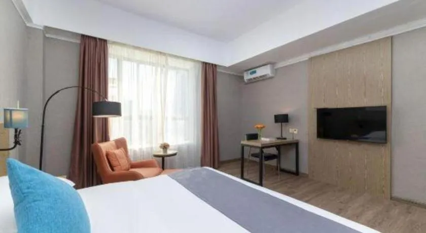 Bed in GreenTree Inn Zhongshan Nanlang Metro Station Branch