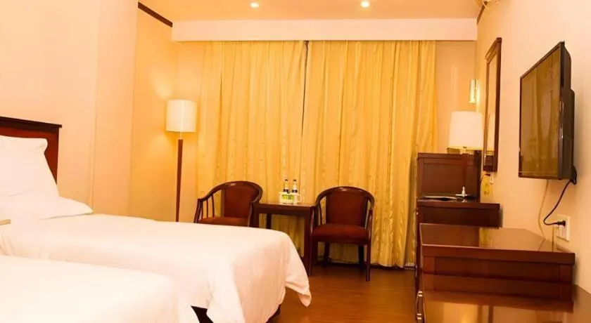 Bed in GreenTree Inn Zhongshan Nanlang Metro Station Branch