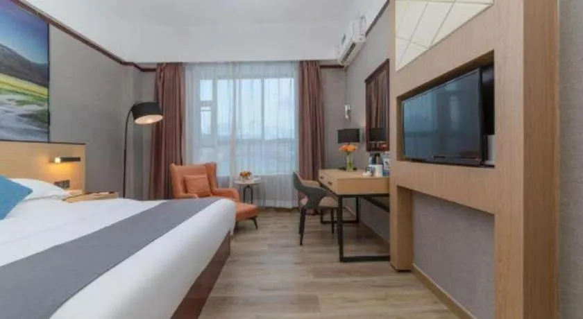 Bed in GreenTree Inn Zhongshan Nanlang Metro Station Branch