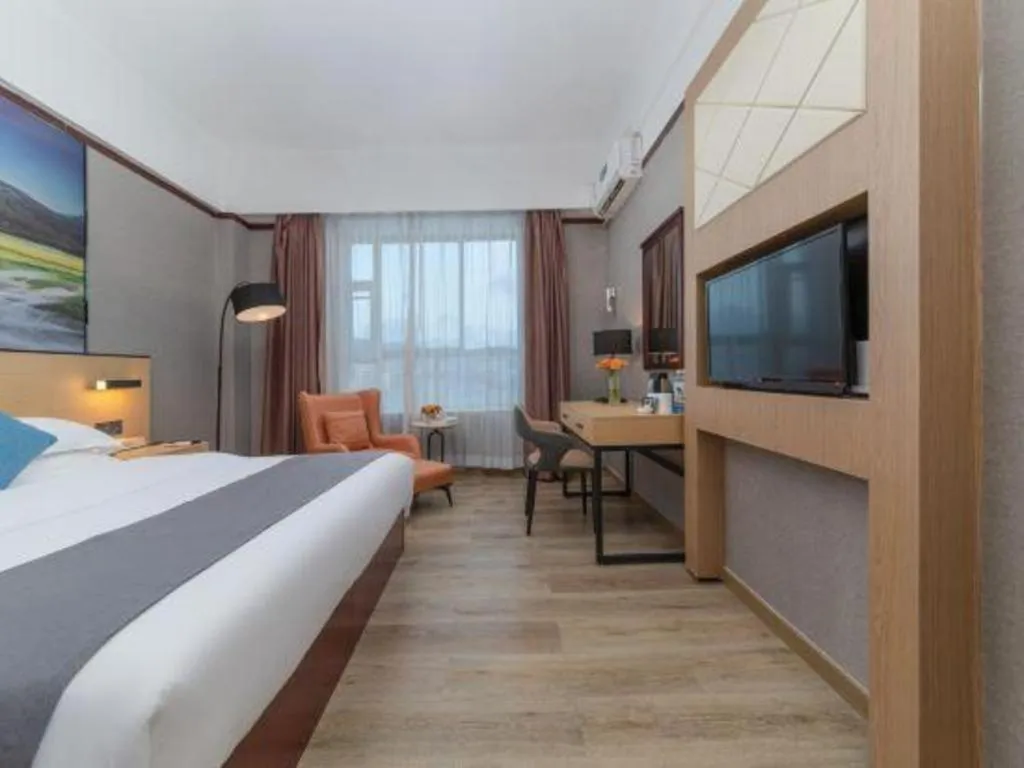 Bed in GreenTree Inn Zhongshan Nanlang Metro Station Branch