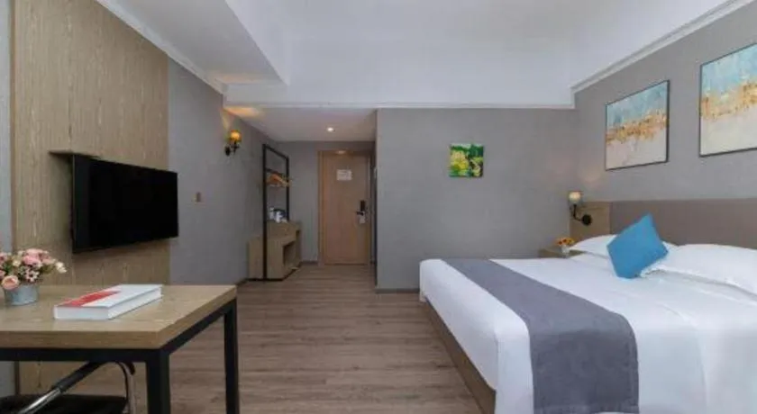 Bed in GreenTree Inn Zhongshan Nanlang Metro Station Branch