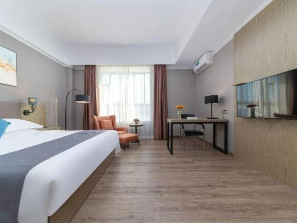 Bed in GreenTree Inn Zhongshan Nanlang Metro Station Branch