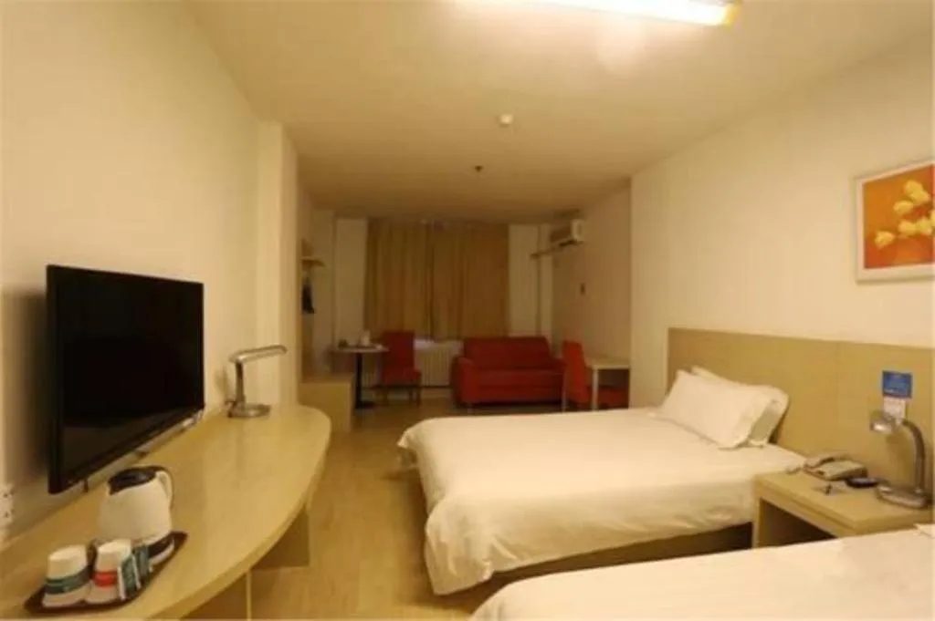 Bed in Jinjiang Inn Qingdao International Exhibition Center Haier Road