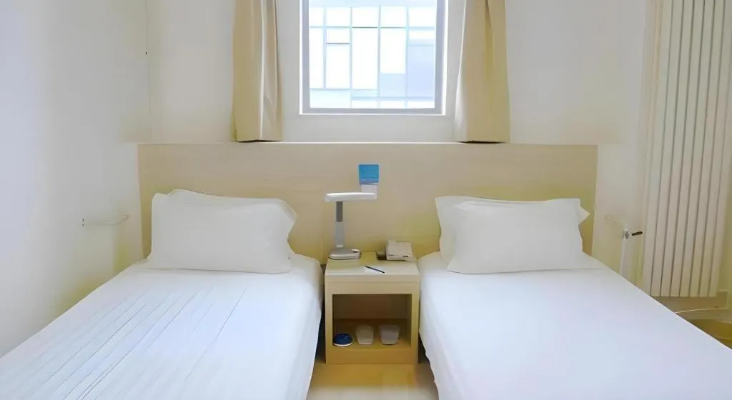 Bed in Jinjiang Inn Qingdao International Exhibition Center Haier Road