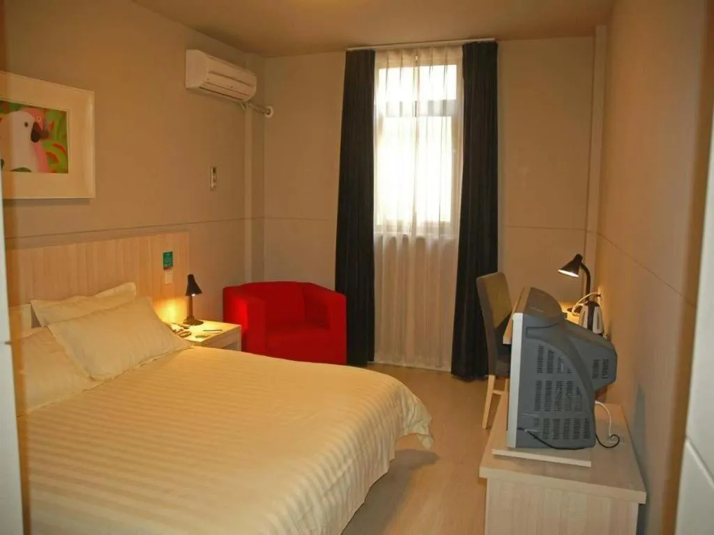 Bed in Jinjiang Inn Qingdao International Exhibition Center Haier Road