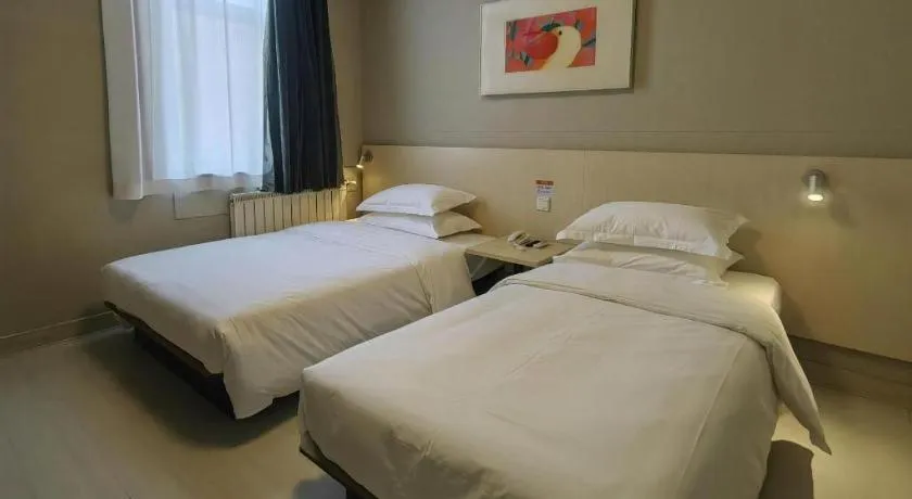 Bed in Jinjiang Inn Qingdao International Exhibition Center Haier Road