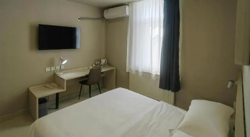 Bed in Jinjiang Inn Qingdao International Exhibition Center Haier Road