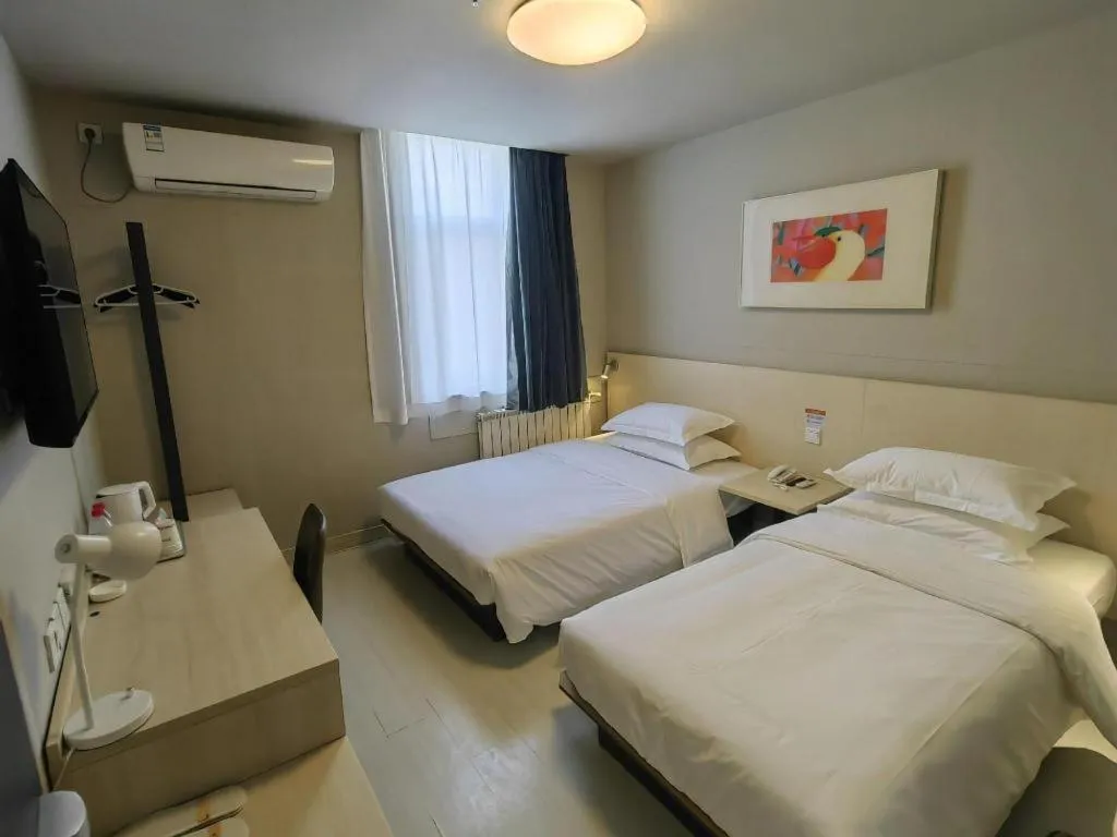 Bed in Jinjiang Inn Qingdao International Exhibition Center Haier Road