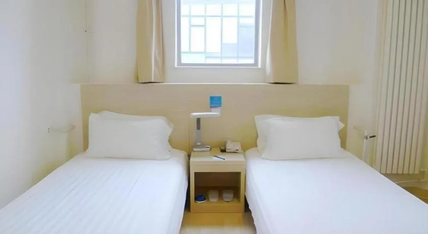 Bed in Jinjiang Inn Qingdao International Exhibition Center Haier Road