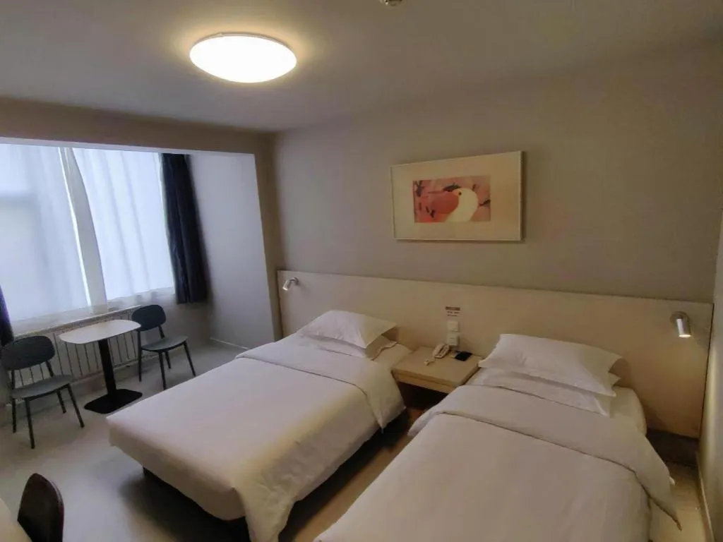 Bed in Jinjiang Inn Qingdao International Exhibition Center Haier Road