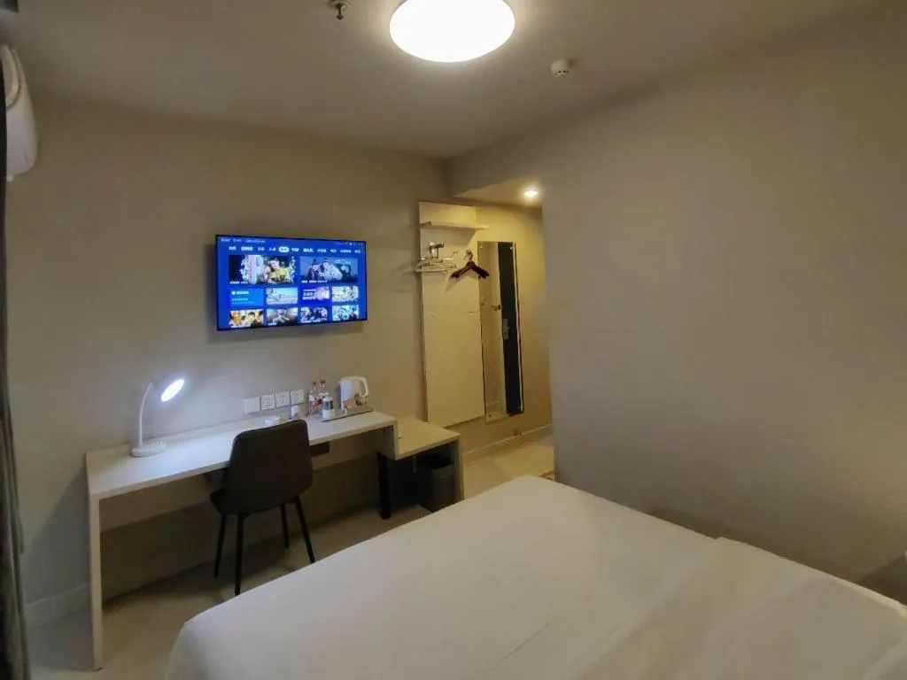 Bed in Jinjiang Inn Qingdao International Exhibition Center Haier Road