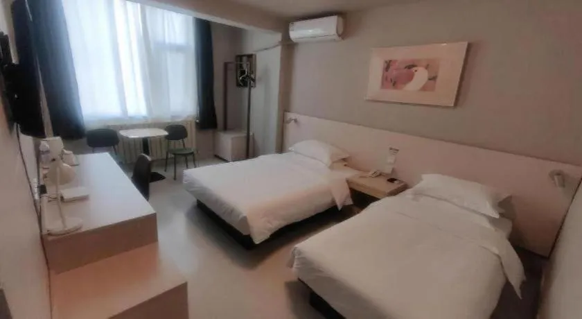 Bed in Jinjiang Inn Qingdao International Exhibition Center Haier Road