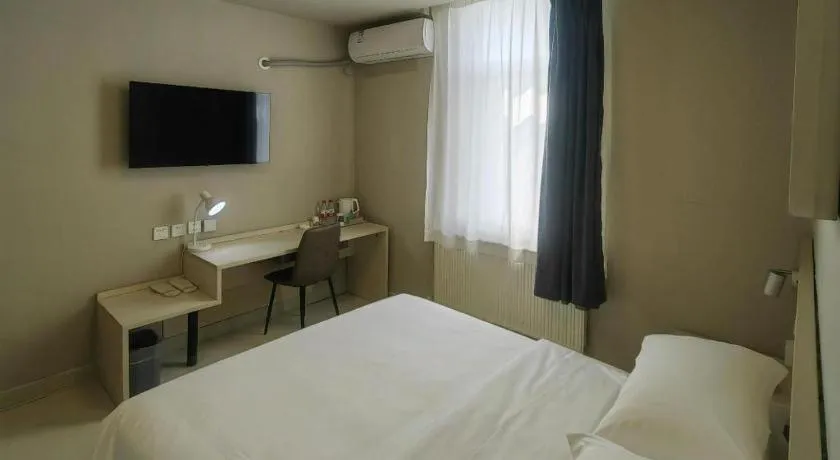 Bed in Jinjiang Inn Qingdao International Exhibition Center Haier Road