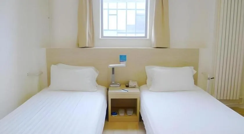 Bed in Jinjiang Inn Qingdao International Exhibition Center Haier Road