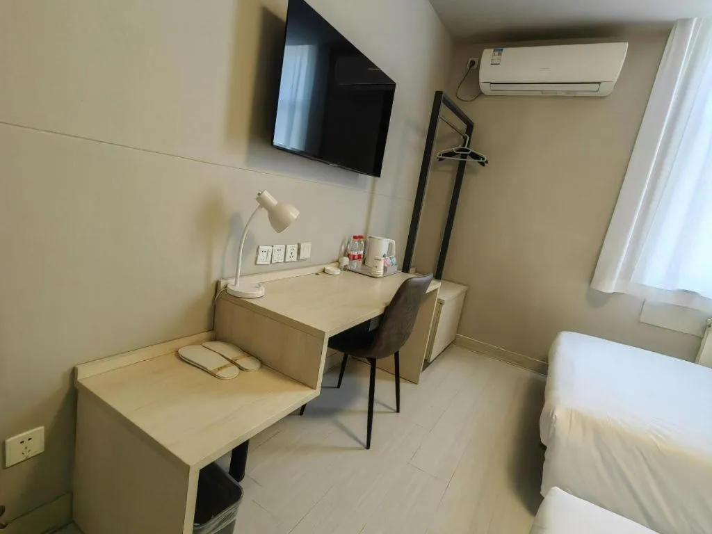 Bed in Jinjiang Inn Qingdao International Exhibition Center Haier Road