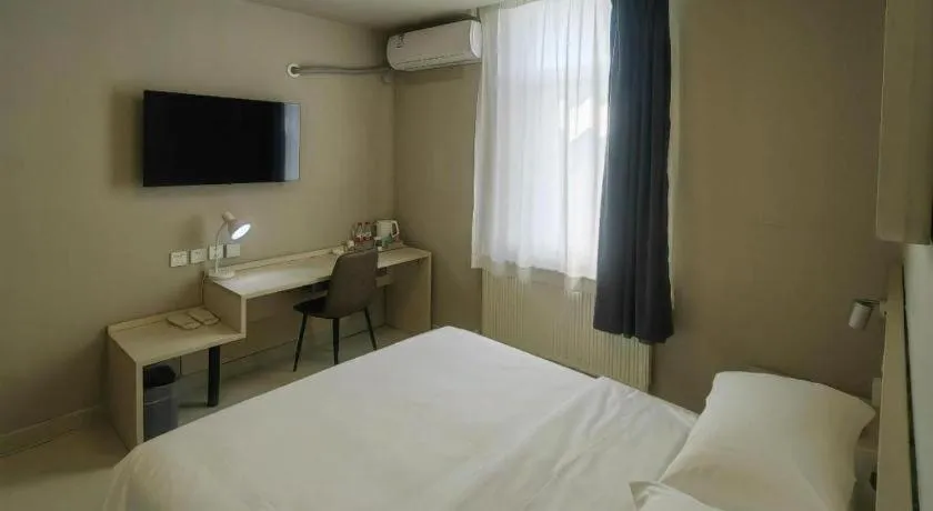 Bed in Jinjiang Inn Qingdao International Exhibition Center Haier Road