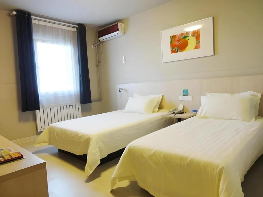 Bed in Jinjiang Inn Qingdao International Exhibition Center Haier Road