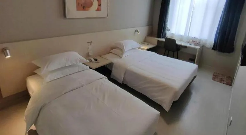 Bed in Jinjiang Inn Qingdao International Exhibition Center Haier Road