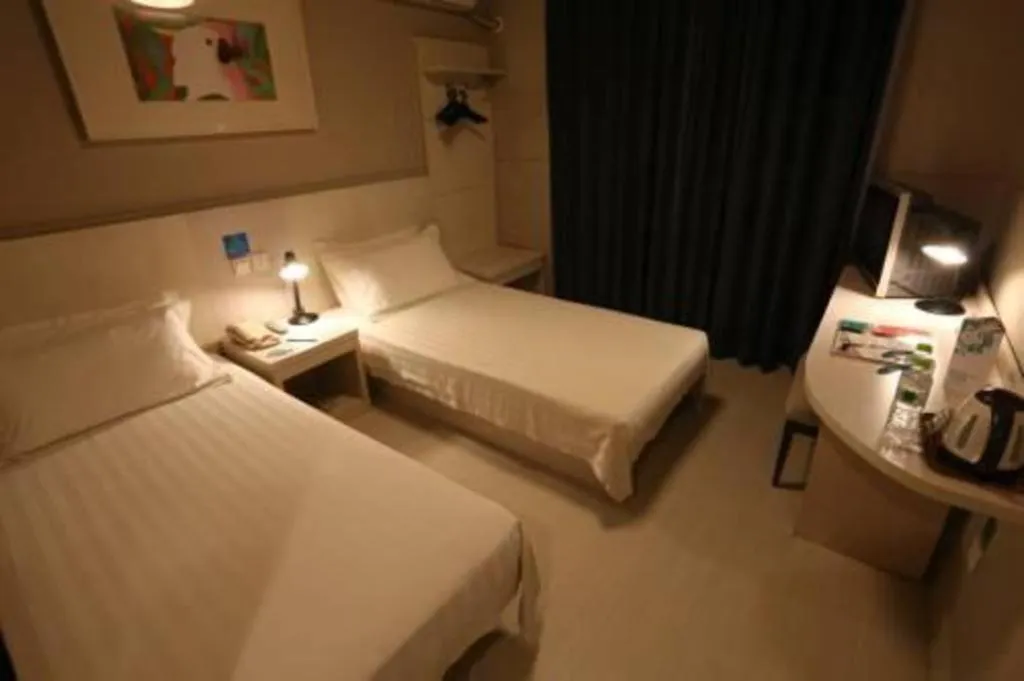 Bed in Jinjiang Inn Qingdao International Exhibition Center Haier Road