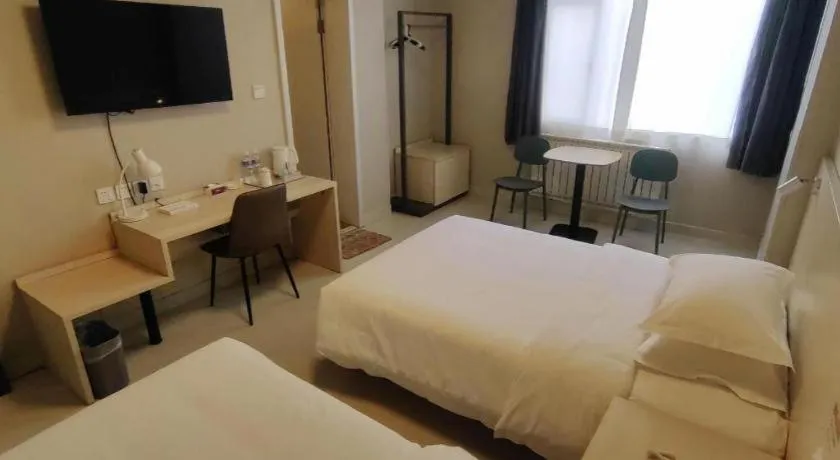 Bed in Jinjiang Inn Qingdao International Exhibition Center Haier Road