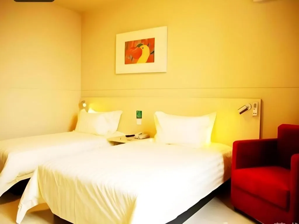 Bed in Jinjiang Inn Qingdao International Exhibition Center Haier Road