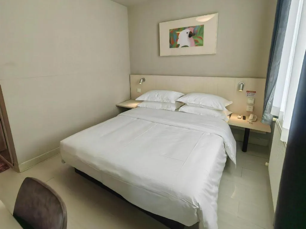 Bed in Jinjiang Inn Qingdao International Exhibition Center Haier Road