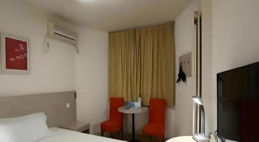 Bed in Jinjiang Inn Qingdao International Exhibition Center Haier Road