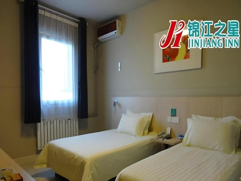 Bed in Jinjiang Inn Qingdao International Exhibition Center Haier Road