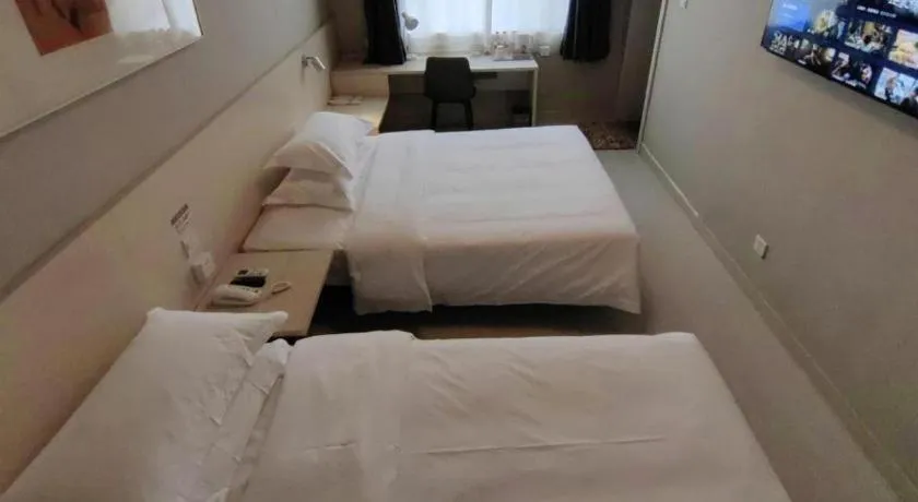 Bed in Jinjiang Inn Qingdao International Exhibition Center Haier Road