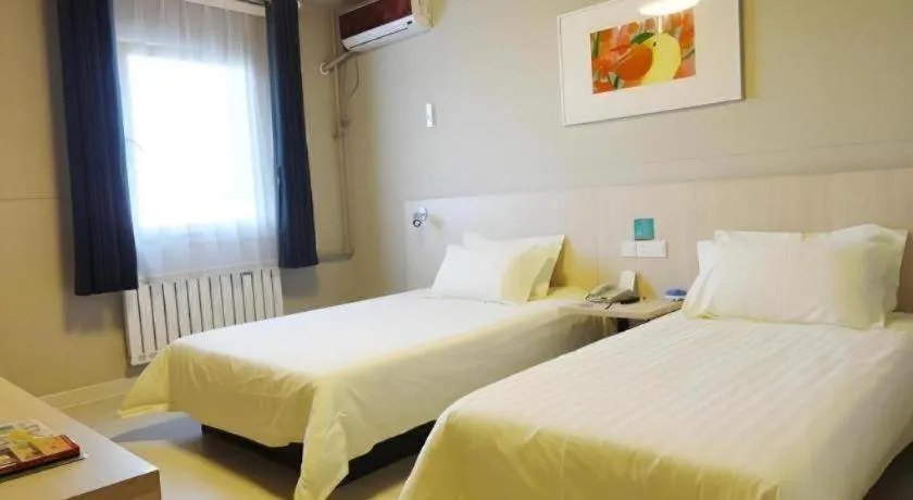 Bed in Jinjiang Inn Qingdao International Exhibition Center Haier Road