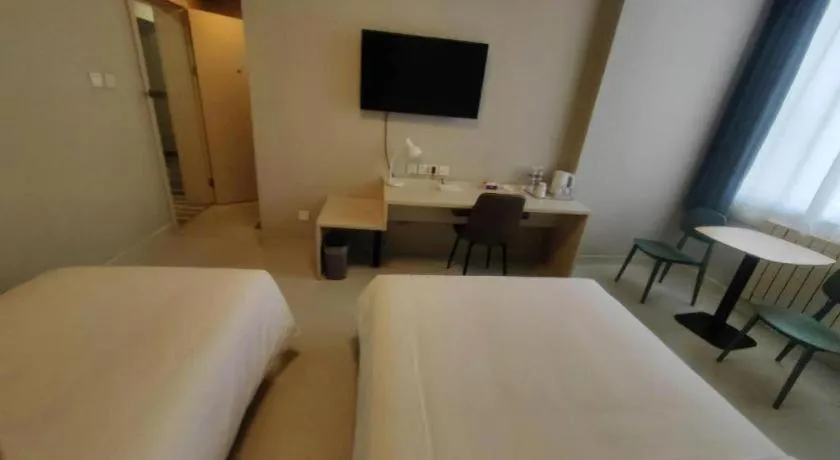 Bed in Jinjiang Inn Qingdao International Exhibition Center Haier Road