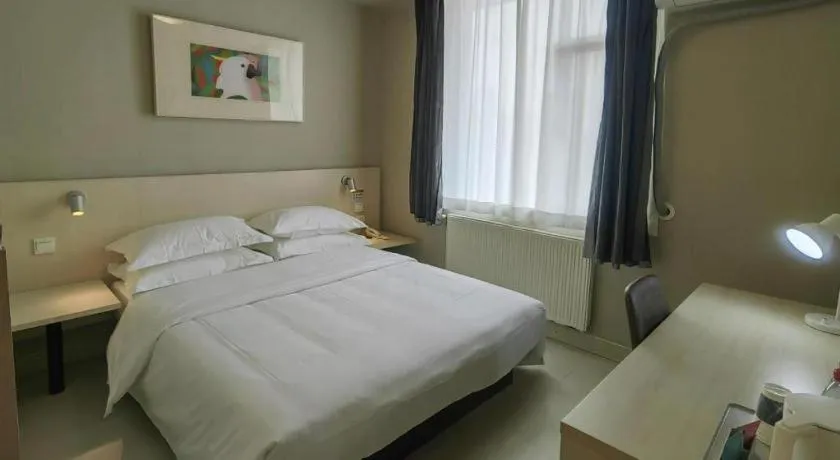 Bed in Jinjiang Inn Qingdao International Exhibition Center Haier Road