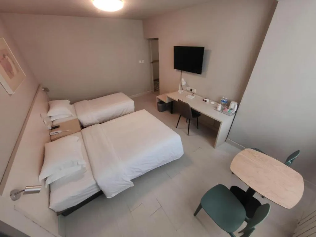 Bed in Jinjiang Inn Qingdao International Exhibition Center Haier Road